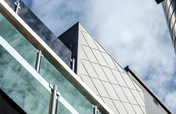 Standing Seam and Shingle cladding in VMZINC Quartz at Bridge Road Apartments, Melbourne