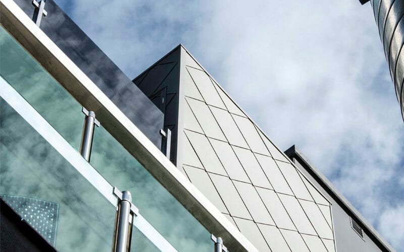 Standing Seam and Shingle cladding in VMZINC Quartz at Bridge Road Apartments, Melbourne