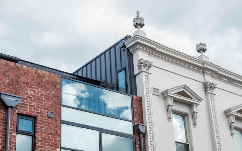 Nailstrip cladding in COLORBOND® Basalt® at Carlisle Street Apartments, Melbourne