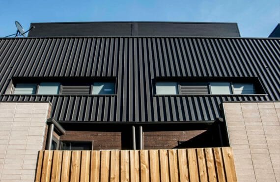 Nailstrip cladding in COLORBOND® Monument® at Charlotte Place Townhouses, Melbourne