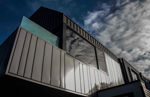 Interlocking and Standing Seam cladding in COLORBOND® Woodland Grey® and COLORBOND® Astro® at Peel Street Townhouses, Melb...