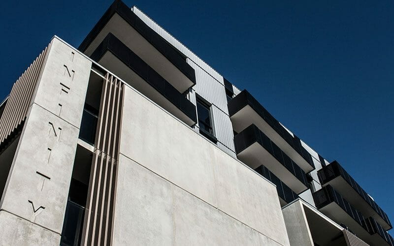 Nailstrip cladding in COLORBOND® Citi Metallic at Infinity Apartments, Melbourne