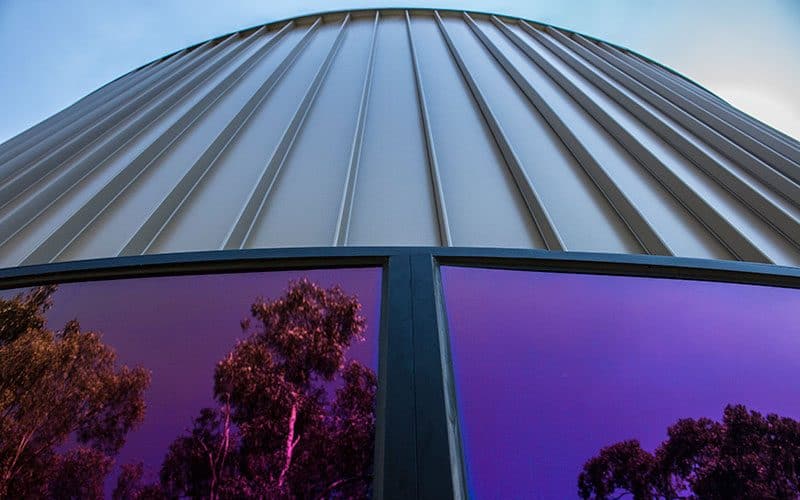 Snaplock (38mm) rolled on site cladding in COLORBOND® Steel Metallic Steel Rhea™ at Biological Science Lab, Melbourne