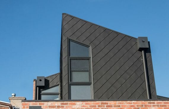Shingle cladding in COLORBOND® Matt Monument at Balaclava Extension, Melbourne